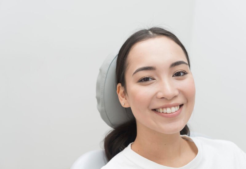 smiling woman dentist scaled